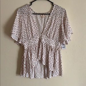 Patterned white flounce top